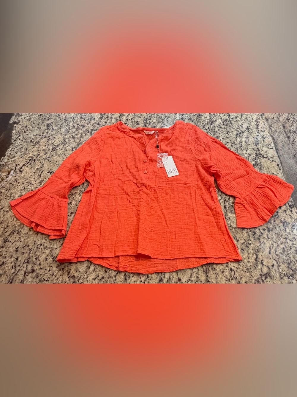 Kaktus Women's Bright Coral Textured Blouse with Bell Sleeves